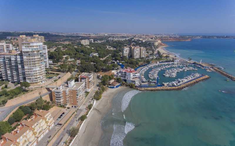 https://spanishnewbuildhomes.com/wp-content/uploads/2021/08/Apartments-For-Sale-in-Campoamor-with-Sea-Views_DJI_0730.jpg